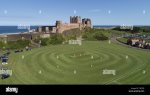 bamburgh-cricket-team-play-their-first-match-of-the-season-against-ellingham-in-the-shadow-of-...jpg