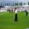 New Zealand players warming up with Chris Harris in the foreground