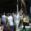 Andrew Flintoff leads his side out onto the Sydney Cricket Ground