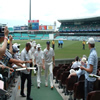 Andrew Flintoff leads England off the field at lunch