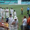 Andrew Strauss and Marcus Trescothick leave the field at the close of play followed by the rest of the England team