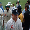 Ian Bell and Monty Panesar leave the field at the close of play