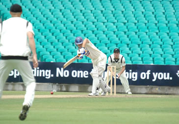 A New South Wales batsman preparing to hit the ball onto the legside